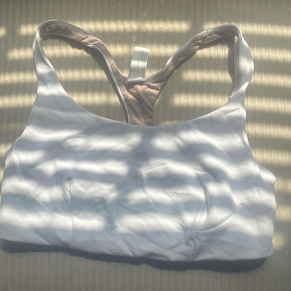 Gently worn lululemon sports bra in color white.